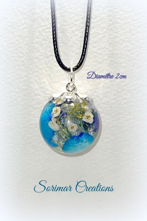 Pendentif sphère inclusions fleurs